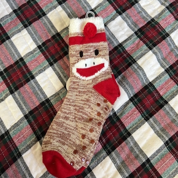 The sock monkey has rubber on the bottom for slip resistant. - Picture 1 of 8